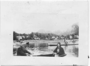 Rev. Peter R. Kelly and Gertrude in a row boat