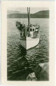 Mission boats approaching wharf